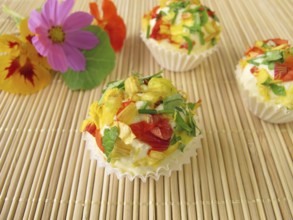 Herb butter pralines with edible flowers