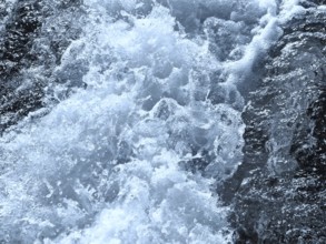 Photo of blue water background with ripples