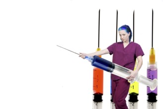 A medical doctor or nurse in scrubs preparing an injection in a giant syringe