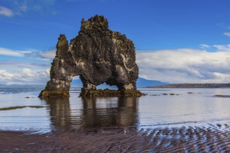 The picturesque cliff in Iceland as huge prehistoric monster. Remains of an ancient extinct volcano