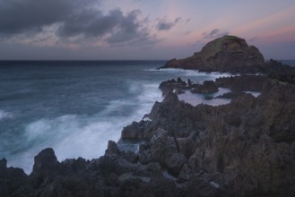 Mole islet landscape in Porto Moniz in Madeira at sunset