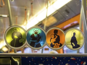 A seat is reserved for the disabled and handicapped in an underground train. Austria