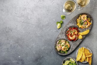 Food, Coloresd ceviches with mango, avocado and tomatoes. White wine, lime and banana chips