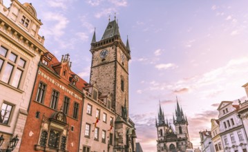 Image with the clock tower and the Church of our Lady before Tyn, at sunrise, in the Old Town
