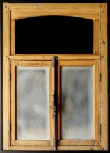 Vintage wooden and weathered rustic window frame with glass and black copy space