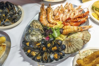 Plate of seafood for sale at a market in Bergen, Norway, Europe