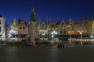 People at the old market square at Bruges, Belgium, July 2017, Europe