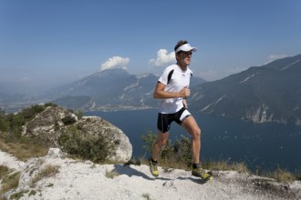 Man running on Lake Garda, trail running, 35, 40, years
