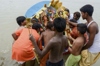 Goddess durga idol immersion at Hooghly river, Kolkata, West Bengal, India, Asia