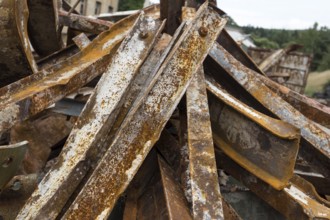 Large rusty steel beams for recycling