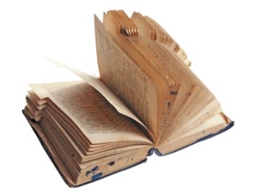 Old open book isolated on white