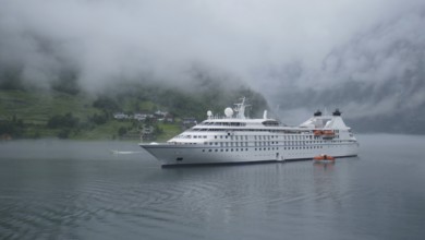 Cruise ship in the fog. Geirangerfjord, Norway, Europe