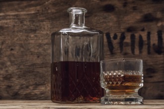 Seasoned brandy into the glasses and decanter vintage style
