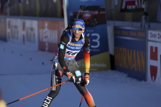 Franziska Preuß (SC Haag) crossing the finish line in the pursuit at the IBU Biathlon World