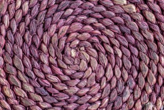 Braided raffia coaster as a background
