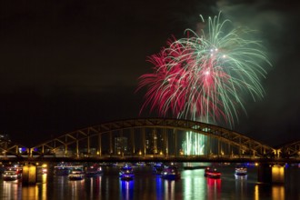 Firework in green and red colours, Cologne, Germany Cologne, Germany, Europe