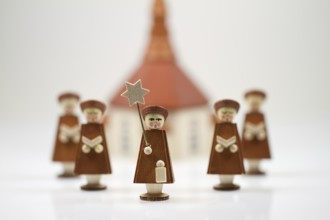 Handcrafted Carolers with white background, produced in Erz Mountains, Germany, Europe