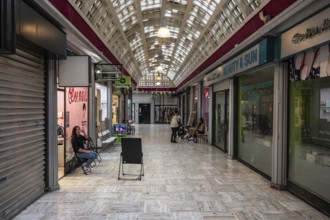 Brussels Old Town, Belgium, 10 28 2022, Art deco interior design with nail shops of the central