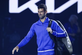 MELBOURNE, AUSTRALIA, JANUARY 11: Novak Djokovic of Serbia and Stefanos Tsitsipas of Greece playt