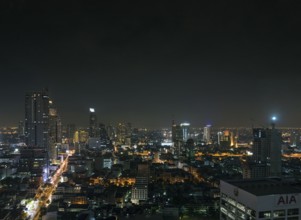 Modern buildings in silom area of central bangkok thailand at night