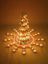 Diyas and flowers arrangement for diwali festival, India, Asia