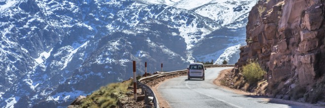 Atlas mountains in Morocco, Africa. Web banner in panoramic view. Road