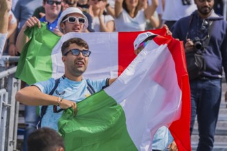 Jul 28, 2024-Paris, FRA, Fans show their support for their favorite players, showing national pride