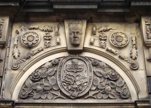 Sowerby bridge, west yorkshire, united kingdom, 16 july 2019: carved heraldic logo over the former