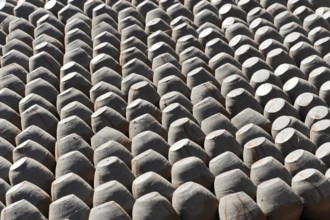 Ordered stacks of clay pots create a repeating geometric pattern, Kathmandu Valley. Kathmandu,