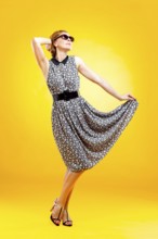 Pin-up girl in american style showing blank signboard