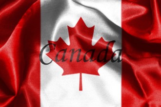 Canadian National Flag With Maple Leaf On It in Red And White Colors With Canada Written On It