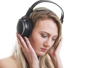 Beauty woman listening music in headphone