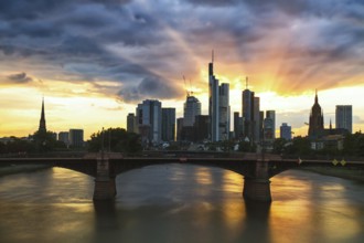 Rays of sunshine on the skyline of Frankfurt, Germany, Europe