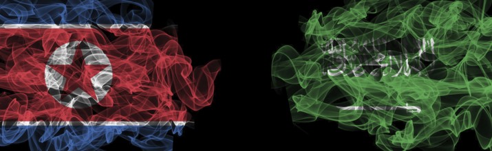 Flags of North Korea and Saudi Arabia on Black background, North Korea vs Saudi Arabia Smoke Flags