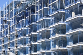 The façade of a residential building under construction in Badalona, Spain, Europe