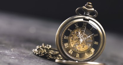 Antique old pocket watch dial close-up. Vintage hipster clock measuring time