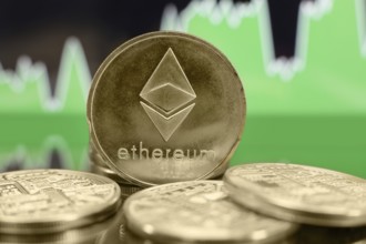 Ethereum ETH cryptocurrency coin on the green chart background. Bubble or bull trend concept