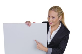 A young pretty woman in business attire with a blank billboard. Austria