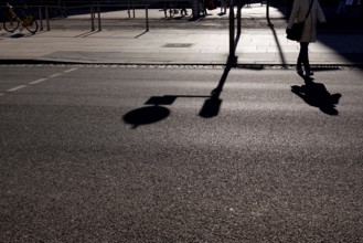 Shadows of passers-by in a big city, winter, Germany, Europe