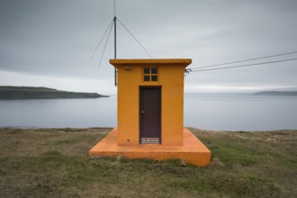 Lighthouse, Drangsnes, Grimsey island in the background, Westfjords, Iceland, Europe