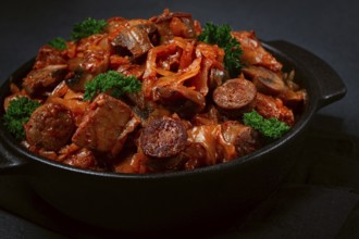 Bigos, bigus is a national Polish dish, made of cabbage and meat, stewed, homemade, no people
