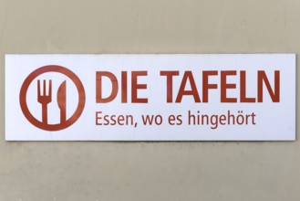 Sign of a food bank, food distribution for the needy, on a house wall, Franconia, Bavaria, Germany,