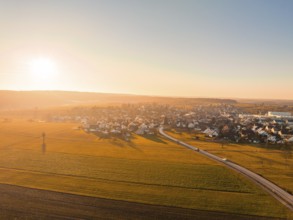 Fields and village in the warm light of sunset, aerial view, Obergaugstett, Calw district, Black