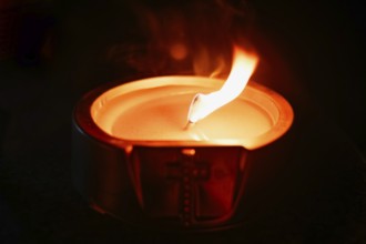 Light on the grave at night