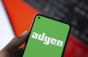 Dhaka, Bangladesh- 09 Nov 2024: Adyen logo is displayed on smartphone. Adyen is a Dutch payment