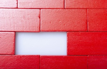 Red color domino blocks placed on a white background