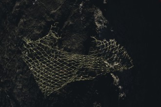 Fishing net piled up as a fishing concept texture