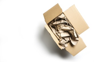 Large packaging for small goods on white, without plastic but natural cardboard box and a lot of