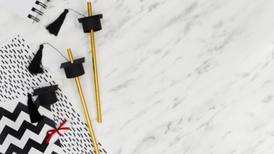 Flat lay festive graduation arrangement marble background