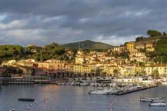 Porto Azzurro, Italy, 12 November, 2023: view of the harbor marina and Porto Azzurro village on